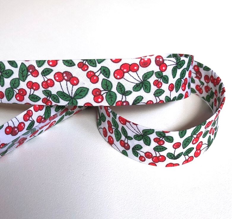 Bias tape folded 20mm with a duo cherry bunch pattern